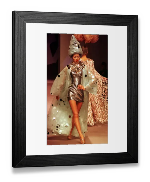 Framed Print : Paco Rabanne Fashions Paris Fashion Week January 1998 A model presents this look