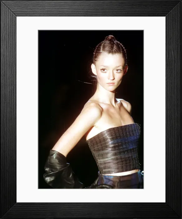 Framed Print : Audrey models a Versace design at the Versace show January 1999 at Paris Fashion