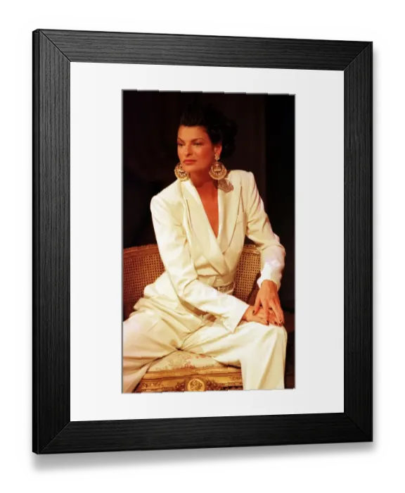 Framed Print : Linda Evangelista at Paris Fashion Week 1997 models a stunning cream trouser suit with Framed Print : Linda Evangelista at Paris Fashion Week 1997 models a stunning cream trouser suit with