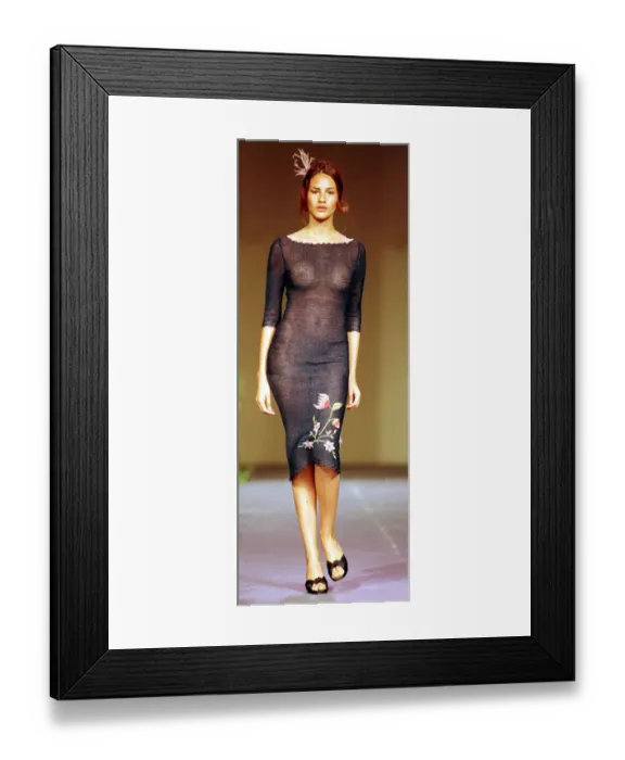 Framed Print : A model wearing a see through black dress October 1998 with flower pattern detail