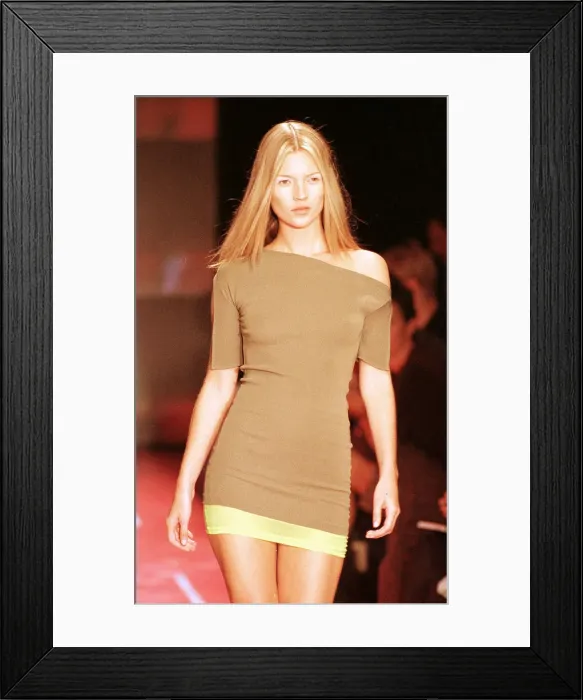 Framed Print : Modelling dress at Milan Fashion Week 5  /  10  /  97 Kate Moss wearing a mini dress