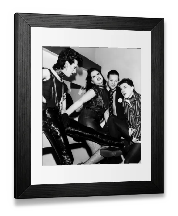 Framed Print : Punk rocker fashion Group of girls and boys in leather trousers wearing school Framed Print : Punk rocker fashion Group of girls and boys in leather trousers wearing school