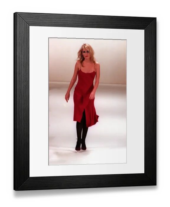 Framed Print : Patsy Kensit models Ben de Lisi design on the catwalk - wearing a red chiffon dress with Framed Print : Patsy Kensit models Ben de Lisi design on the catwalk - wearing a red chiffon dress with