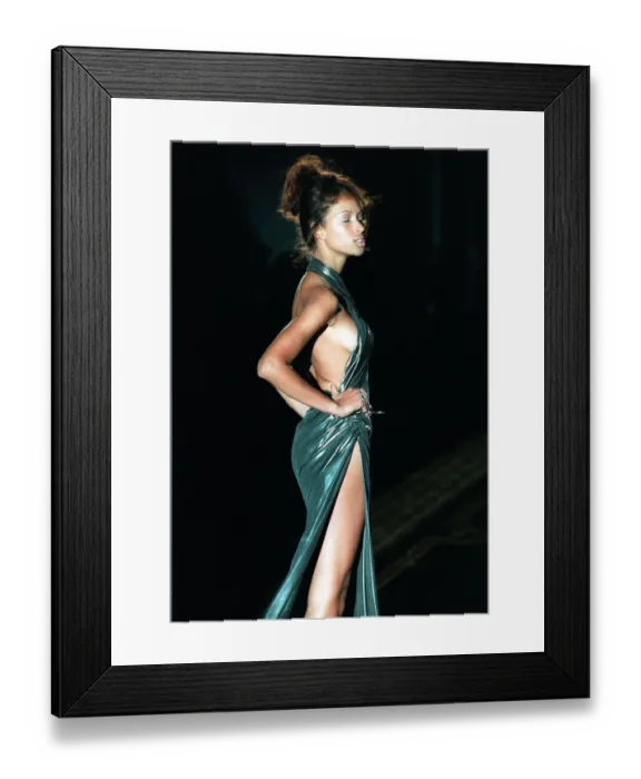 Framed Print : Gianni Versace Fashion Show in Paris France Jan 94 Model wearing a backless green