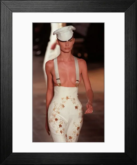 Framed Print : A model walks down the catwalk wearing Givenchy in Paris - patterened tight trousers Framed Print : A model walks down the catwalk wearing Givenchy in Paris - patterened tight trousers