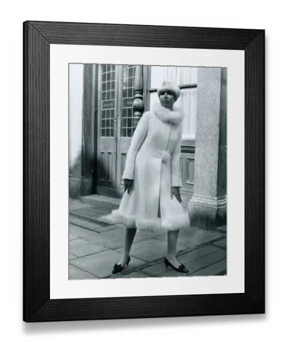 Framed Print : Fashion 1960s Model standing outside Carrot on Wheels boutique wearing a mid-calf