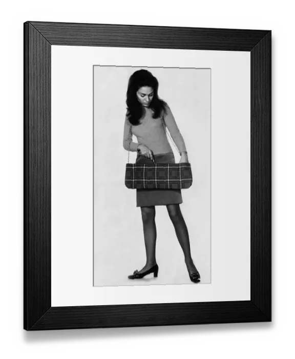 Framed Print : Break into Highland sling: This sausage-shped tartan tote-bag takes all the clutter out