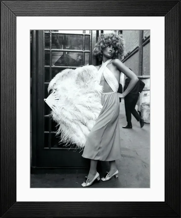 Framed Print : Fashion 1960s Model standing by a telephone box in London in a Gangter