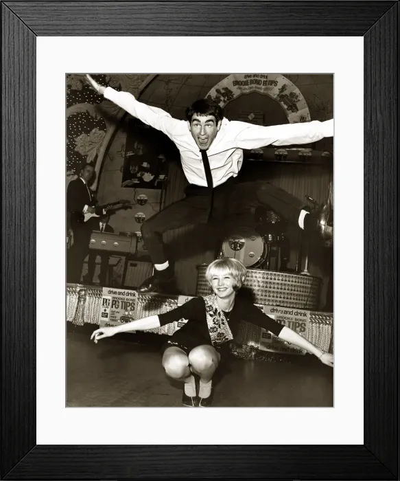 Framed Print : Dances The Twist. A couple demonstrate dancing the twist at the Twist Framed Print : Dances The Twist. A couple demonstrate dancing the twist at the Twist