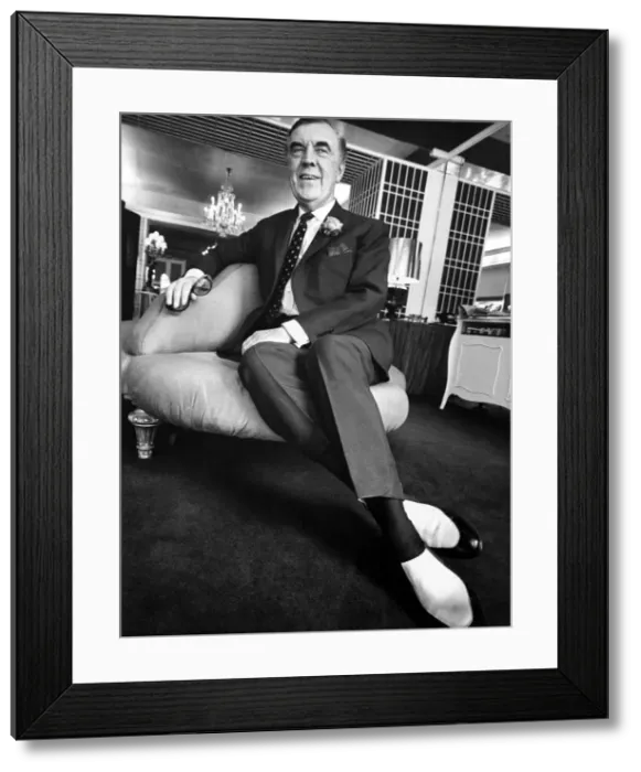 Framed Print : Norman Hartnell, Fashion Designer in Mayfair. Young Mr Hartness shows off Framed Print : Norman Hartnell, Fashion Designer in Mayfair. Young Mr Hartness shows off
