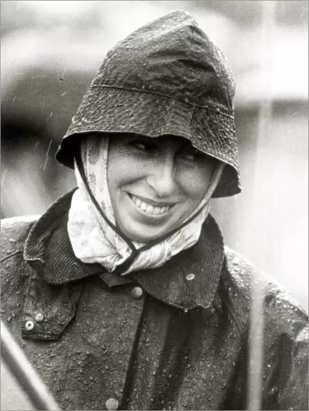 Princess Anne looking wet in Rain Gatcombe Park Smiling in wet-weather gear