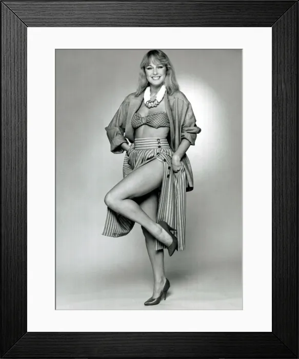 Framed Print : Fashion 1980s Model wearing a striped skirt, silk jacker Framed Print : Fashion 1980s Model wearing a striped skirt, silk jacker