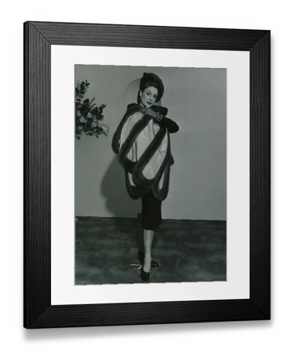 Framed Print : Fashion 1950s Model wearing a wild mink stole on pleated taffeta with matching gloves