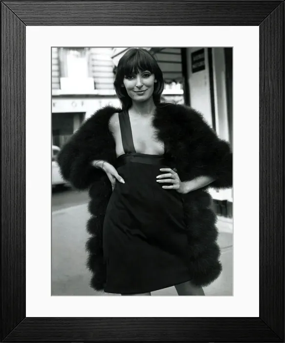Framed Print : Fashion 1960s Model standing in a street in Paris wearing a mini skirt dress