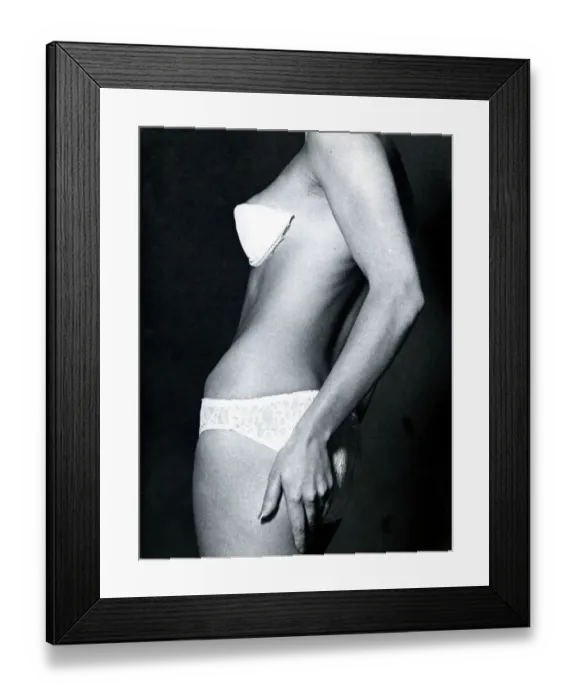 Framed Print : A model wearing a strapless and backless bra and knickers 1960s