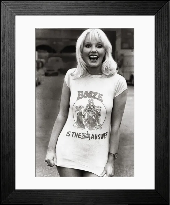 Framed Print : The model seems to happily support the message her T-Shirt brings across Framed Print : The model seems to happily support the message her T-Shirt brings across