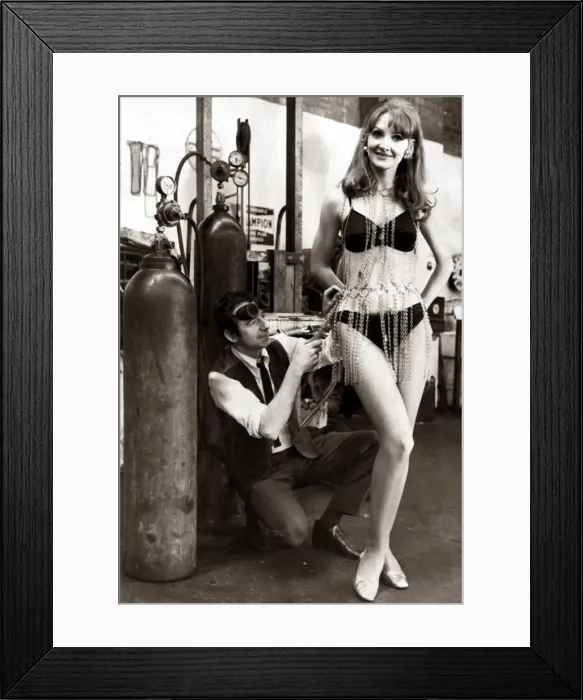 Framed Print : Liverpool model Terry Duffy of Aintree wearing a chain dress designed by her husband to