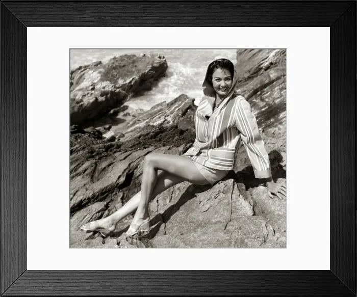 Framed Print : Chrystal Dawson at Newquay Wearing a hooded jacket with matching shorts Framed Print : Chrystal Dawson at Newquay Wearing a hooded jacket with matching shorts