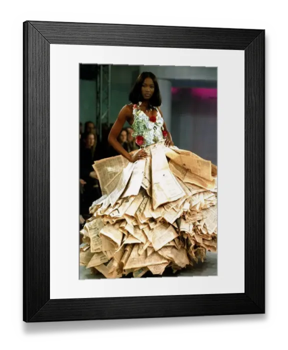  : Naomi Campbell wearing a newspaper and money dress at the Clothing Brition Fashion Show