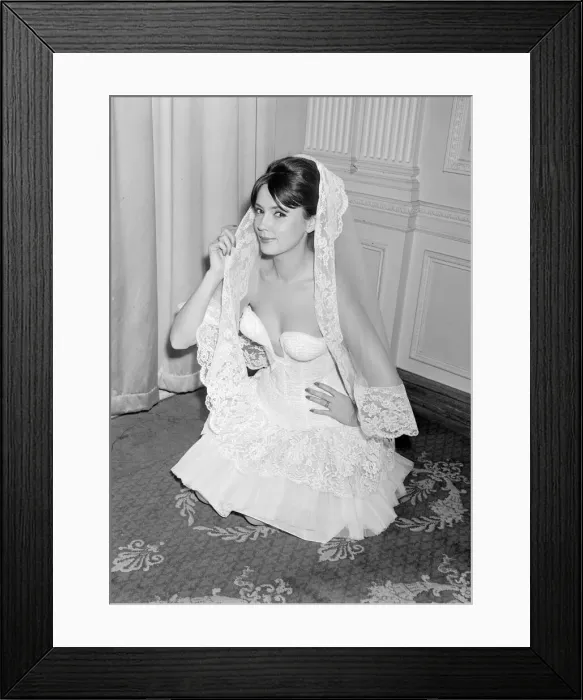 Framed Print : Model Helga Allgoaoer modelling a dress designed by Hans Ostergard - a white fitted Framed Print : Model Helga Allgoaoer modelling a dress designed by Hans Ostergard - a white fitted