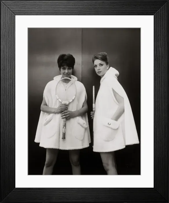 Framed Print : Models Sandra Russell (left) and Judy Wilson showing a zip-up hooded cape in fur fabric Framed Print : Models Sandra Russell (left) and Judy Wilson showing a zip-up hooded cape in fur fabric