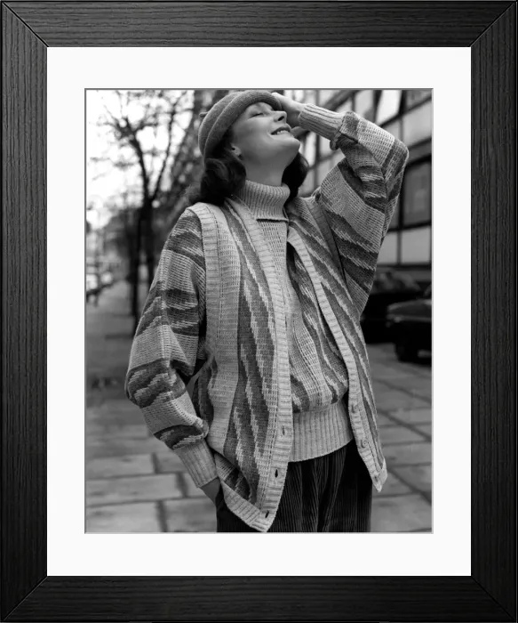 Framed Print : The model is wearing a bold jacquard design by Angus Stewart for Morley