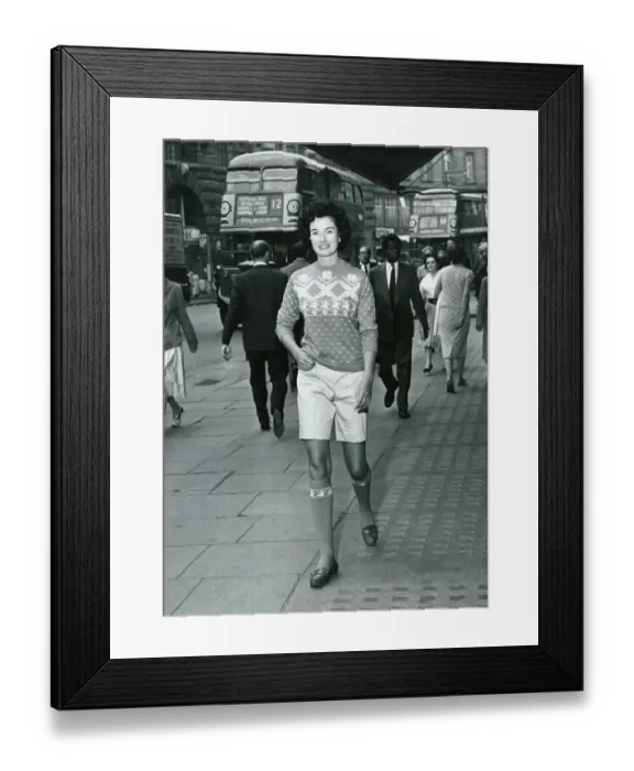 Framed Print : Fashion 1950s Model wearing shorts and a wool jumper