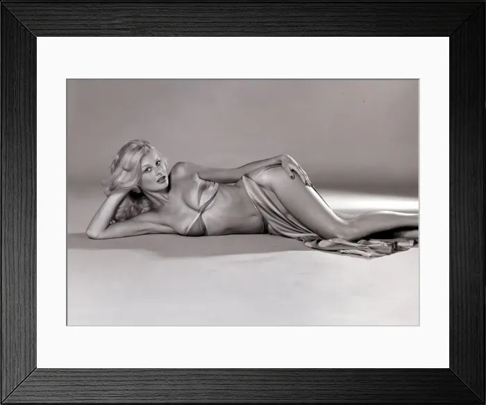 Framed Print : Jilly Johnson Glamour Model September 1975 Wearing a bikini lying on her side