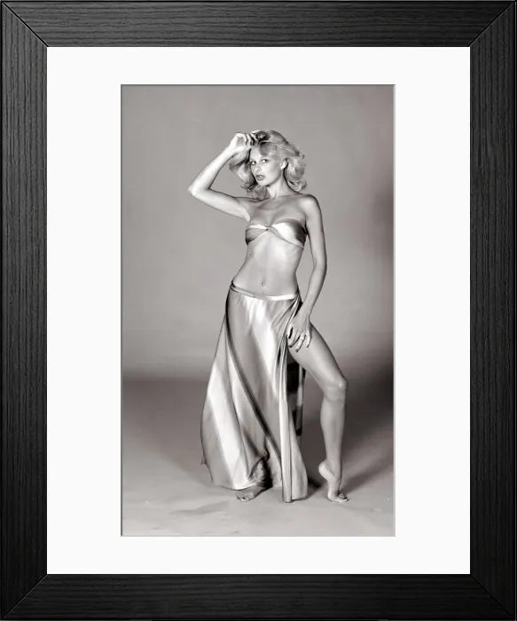 Framed Print : Jilly Johnson Glamour Model September 1975 Wearing a gold bikini with matching