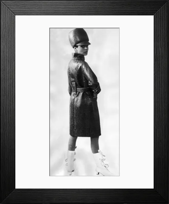 Framed Print : Leather Rainwear September 1965 Model wearing black Leather coat and hat Framed Print : Leather Rainwear September 1965 Model wearing black Leather coat and hat