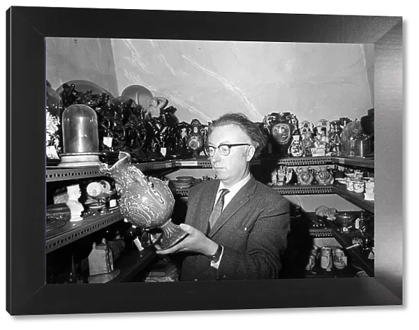 Bowes Museum Jan 1970 Director Frank Atkinson studies some of the antque items