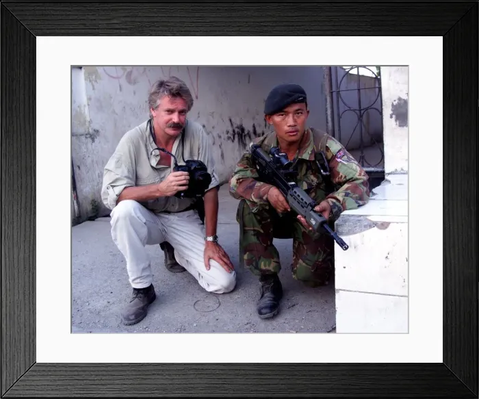 Framed Print : Photographer Mike Moore with Gurkha soldier on patrol in Dilli Framed Print : Photographer Mike Moore with Gurkha soldier on patrol in Dilli
