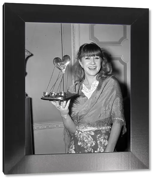 Actress Helen Mirren with her award at the Show Business Personality of 1975 as the best