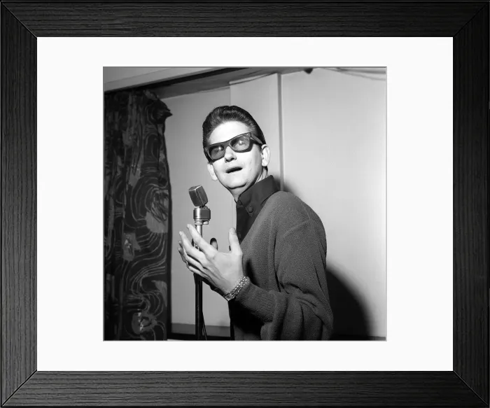 Framed Print : American singer Roy Orbison at the Microphone at ATV House in London where he has signed Framed Print : American singer Roy Orbison at the Microphone at ATV House in London where he has signed