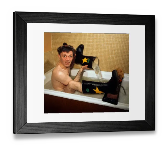 Framed Print : Russell Hunter in bath wearing wellies April 1975 Framed Print : Russell Hunter in bath wearing wellies April 1975