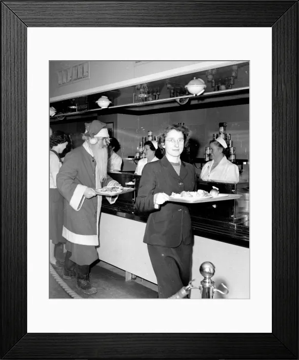 Framed Print : Santa Claus collects his lunch at the staff canteen at Kingston Store after a hard Framed Print : Santa Claus collects his lunch at the staff canteen at Kingston Store after a hard