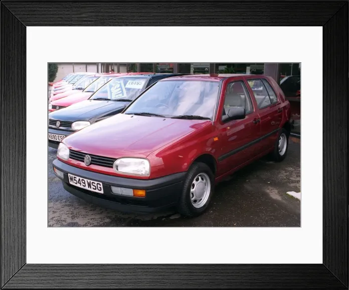 Framed Print : Volkswagen GOLF MKIII April 1998 Forecouert of garage dealers