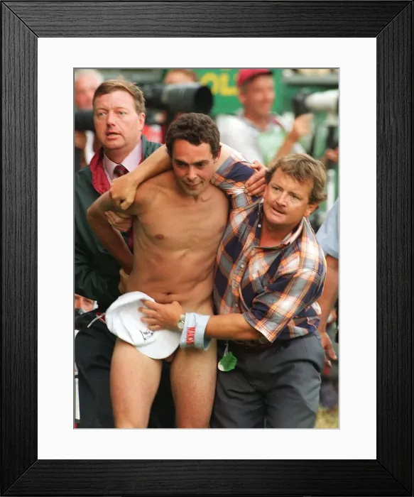 Framed Print : Streaker at the open Golf Championships at Royal Lytham is covered by hat Framed Print : Streaker at the open Golf Championships at Royal Lytham is covered by hat