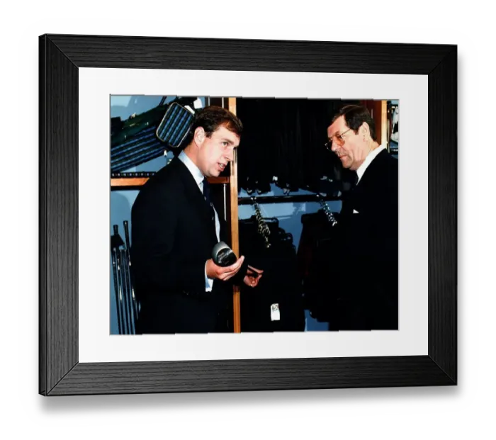 Framed Print : Prince Andrew after opening new clubhouse Turnberry looking at golf club with Bob Framed Print : Prince Andrew after opening new clubhouse Turnberry looking at golf club with Bob
