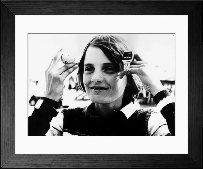 Framed Print : Alex Tindall holds up her new watch and a golfball which were given to her by Craig Framed Print : Alex Tindall holds up her new watch and a golfball which were given to her by Craig