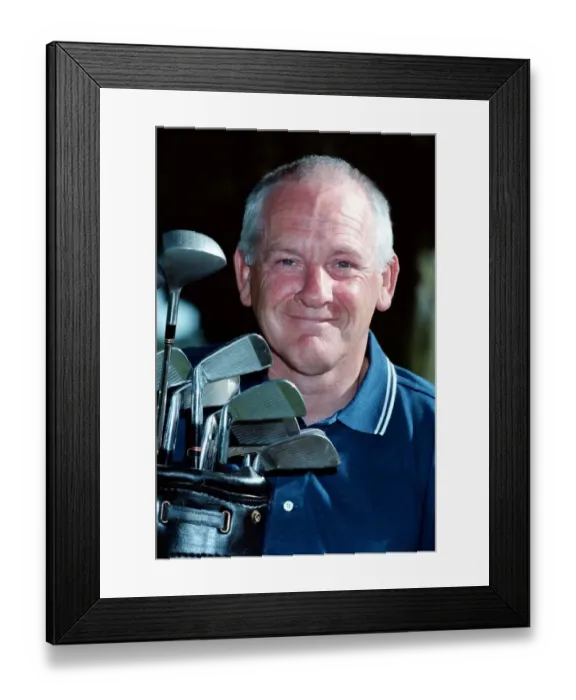 Framed Print : Willie Docherty June 1999 Kincardine golfer holding bag of golf clubs