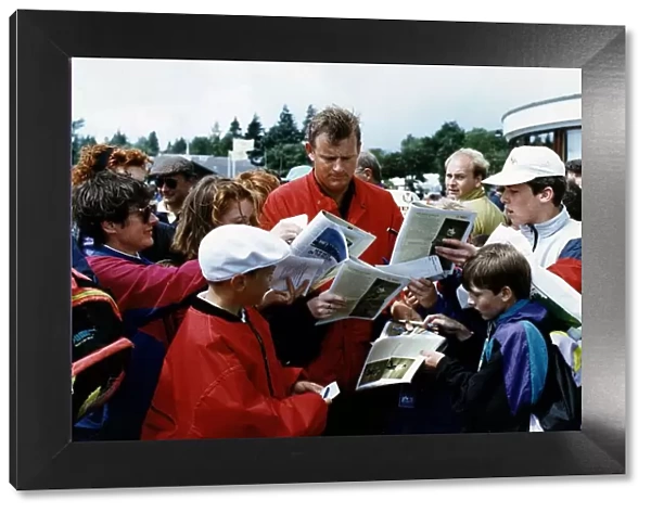 Sandy Lyle signs autographs for his fans at the British Golf Open