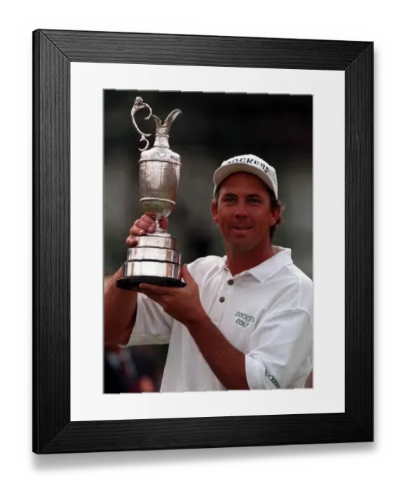  : Tom Lehman holds the trophy after beating Nick Faldo at British Open Royal Lytham St