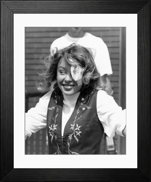 Framed Print : Australian pop singer and actress Kylie Minogue, who accidently scratched her eye Framed Print : Australian pop singer and actress Kylie Minogue, who accidently scratched her eye