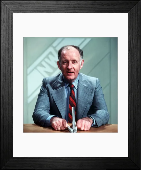 Framed Print : Frank Bough TV Presenter sitting at desk reading news Framed Print : Frank Bough TV Presenter sitting at desk reading news