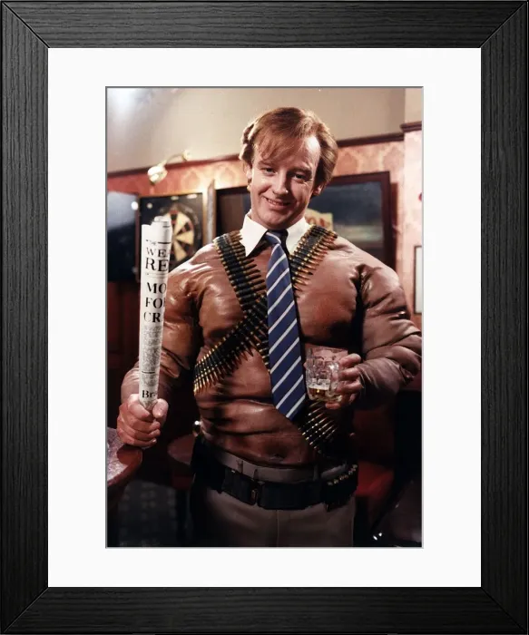 Framed Print : Les Dennis Comedian and TV Presenter in scene from Christmas Show where as he plays some Framed Print : Les Dennis Comedian and TV Presenter in scene from Christmas Show where as he plays some