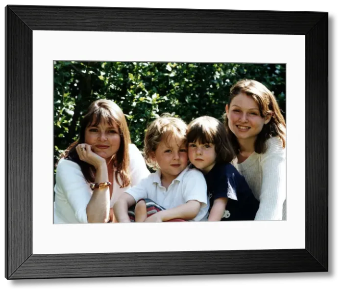 Framed Print : Janet Ellis TV Presenter with her family Framed Print : Janet Ellis TV Presenter with her family