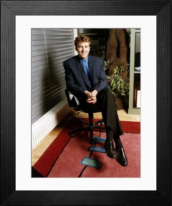 Framed Print : Jonathan Ross TV Presenter sitting in chair Framed Print : Jonathan Ross TV Presenter sitting in chair