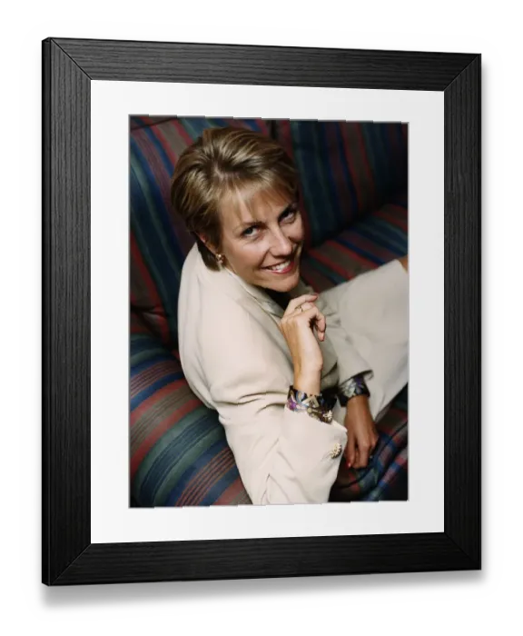 Framed Print : Jill Dando TV Presenter sitting with legs up on sofa Framed Print : Jill Dando TV Presenter sitting with legs up on sofa