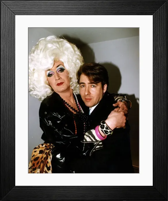 Framed Print : Jonathan Ross TV presenter with arms around drag queen Lily savage Framed Print : Jonathan Ross TV presenter with arms around drag queen Lily savage